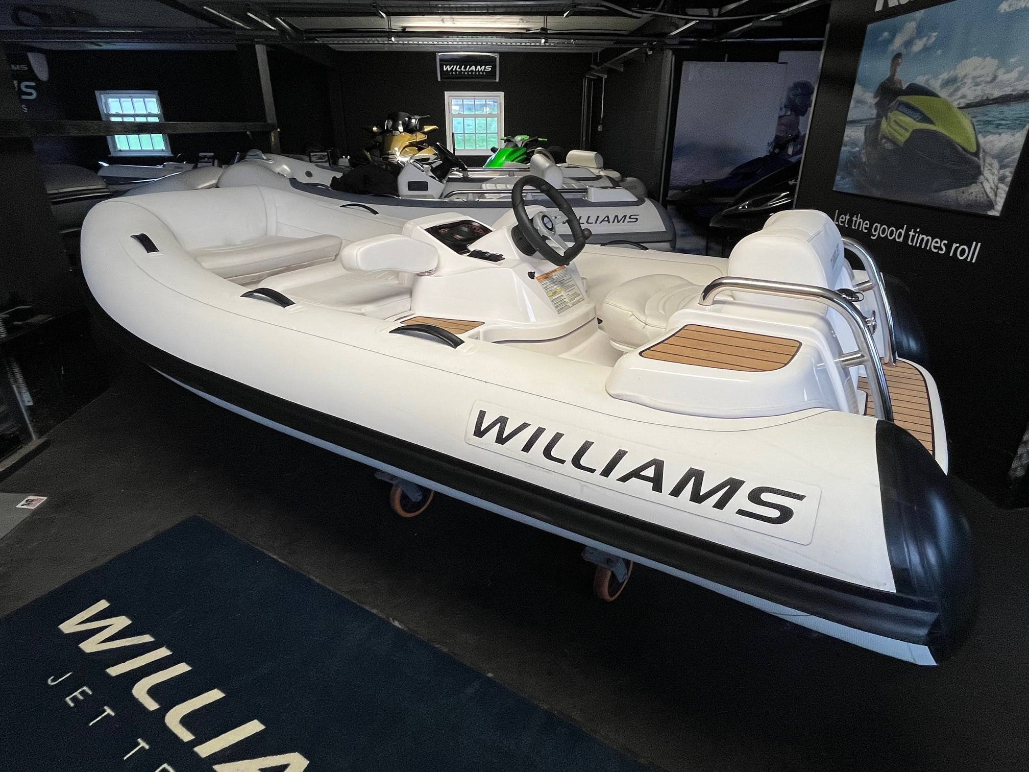 2019 Williams Turbojet 325 fitted with a 90HP Rotax 93 BRP 3 Cylinder engine with 81 hours. This is a pre-owned face lifted version of the Turbojet 325 with a sleeker style and lighter overall weight and the Rotax engine. Specification includes: Carbon White Tubes with Black details. Teak side pods &amp; footwells. Under-seat storage, 12v DC socket, Sealed upholstered seating (removable). Sports boat hull shape, Piped deck drains, Automatic fire extinguisher, Speedometer (GPS), RPM gauge with digital hour metre. Fuel gauge, Single lever throttle/Shift control. Plug in navigation lights, (Port/Starboard/Running), Stainless steel rear handles, Forward seat neoprene/Fabric grab handles, Engine flushing attachment, Bow U Bolt, Four lifting pad-eyes, Ski eye, Two rear tie down points, Automatic bilge pump, Bilge blower, Battery isolator, Tube repair kit, Footpump (2 Stage), Owner's manual, Fitted fuel tank, Hand-made inflatable tube with rubstrake and grab handles, Folding backrests.
 A nimble tender that defies its size, the Turbojet 325 is designed to easily fit into the tender garage or bathing platform of most 12m to 16m (39ft to 52ft) yachts. It will take you smoothly to the quayside for supplies or a leisurely bite to eat. But open up the throttle and she'll show you a different side. The sports hull and Rotax engine come into their own, carving tight circles or going flat out in secure straight lines for waterskiing bliss. BOATS.CO.UK ARE THE UK'S DEALERSHIP FOR WILLIAMS PERFORMANCE JET TENDERS. WE SPECIALIZE IN NEW AND PRE-OWNED WILLIAMS. WE CAN PART EXCHANGE AND BUY OUTRIGHT. Contact or email Darren@Boats.co.uk on 01702258885 for more information.
